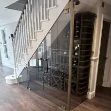 Under Stairs Glass Wine Store Cut to the Rake of the Staircase, Delamere Cheshire Under Stairs Glass Wine Store Cut to the Rake of the Staircase, Delamere Cheshire